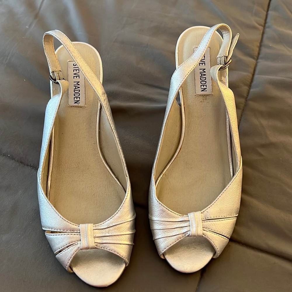 Steve madden  silver leather uppers ,slingback pumps, size 8 three inch heels